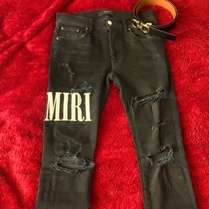 AMIRI Distressed Slim Fit Jeans.